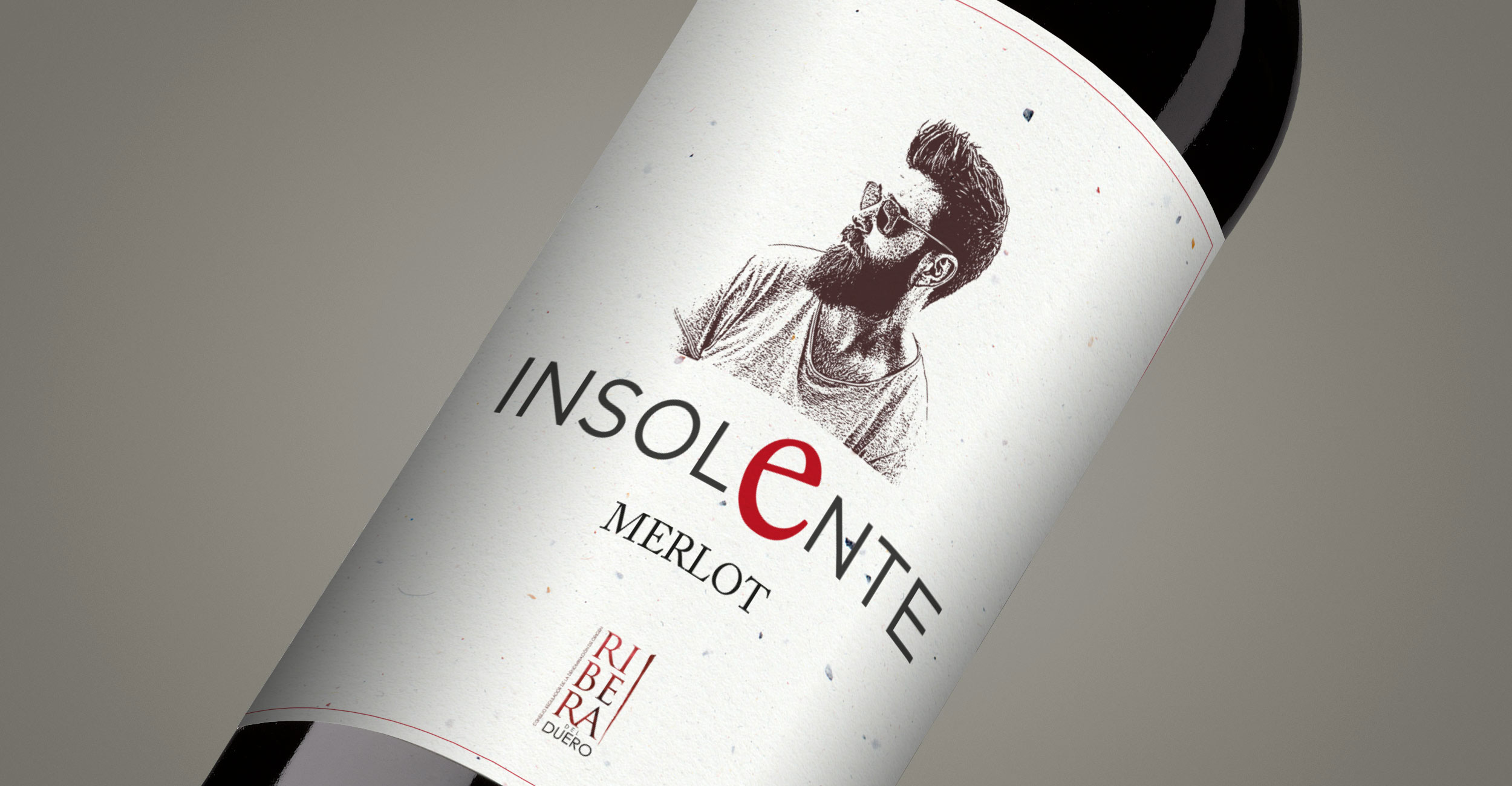 Diseño gráfico y creativo de etiquetas de vino tinto joven y packaging de vino para INSOLENTE
